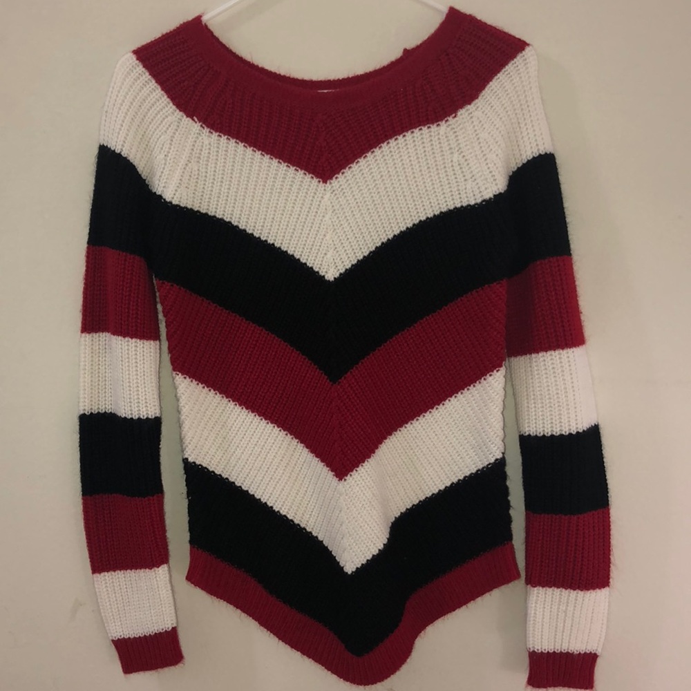 i'm am selling a red,white and black sweater